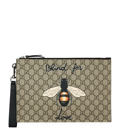 gucci bee key pouch|More.